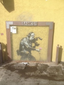 Banksy came to Sundance and left his artwork on the side of a building.