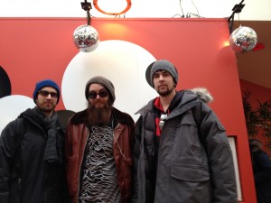 Caleb Peyman Michael Nowlin and Tyler McDowell at the Sundance Box Office striking a celebrity pose.