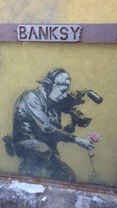 Banksy came to Sundance and left his artwork on the side of a building.